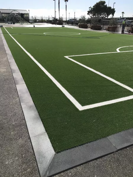 School turf edge ramps